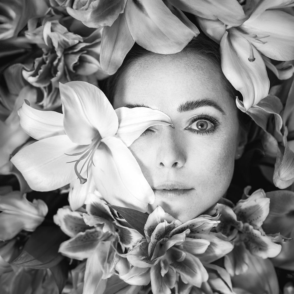 Black-and-white Song of Songs album artwork featuring Anastasia Minster among flowers